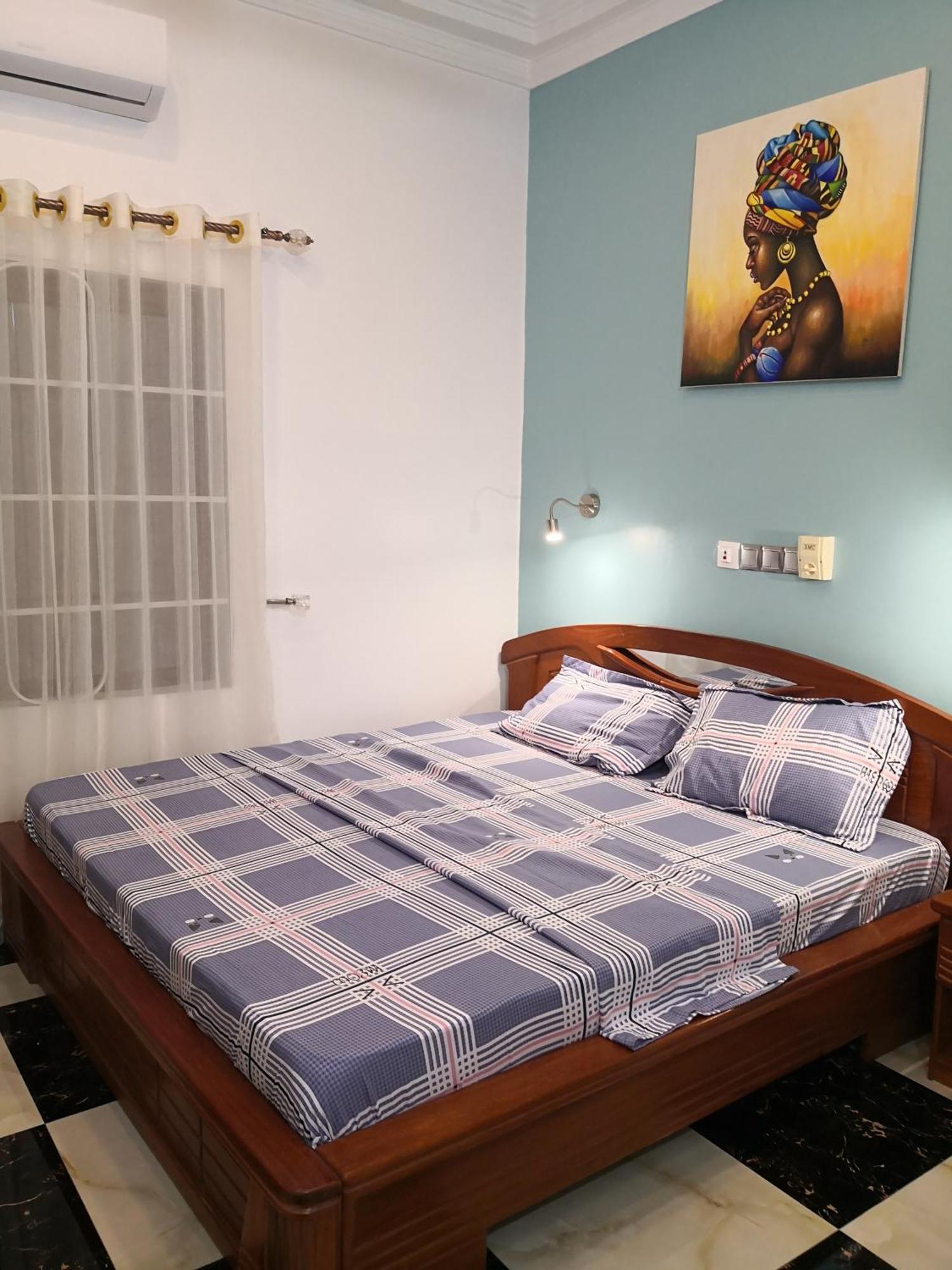 Residence Palais Du Stade Cotonou Quarto foto